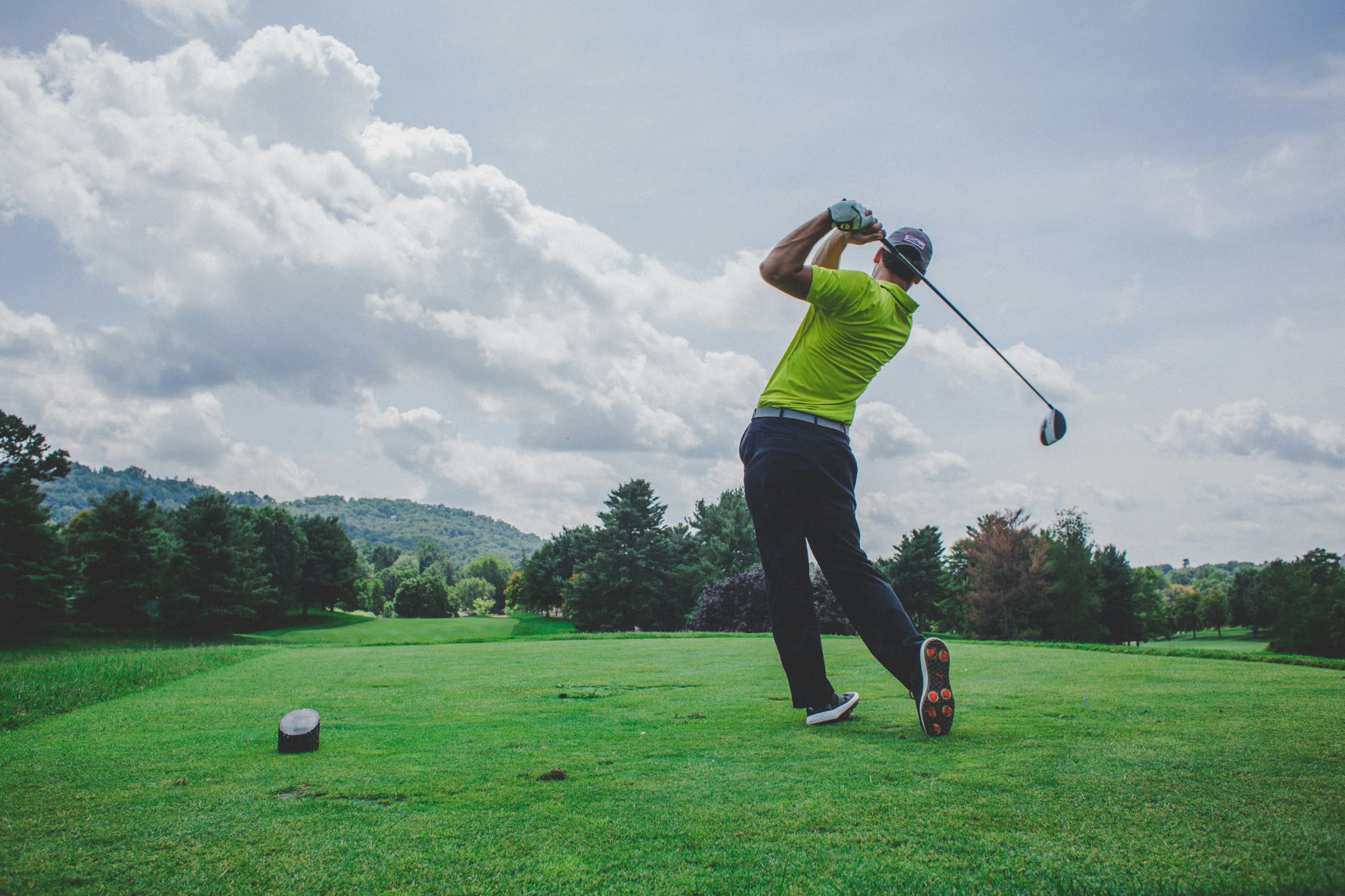 A golfer on a green course