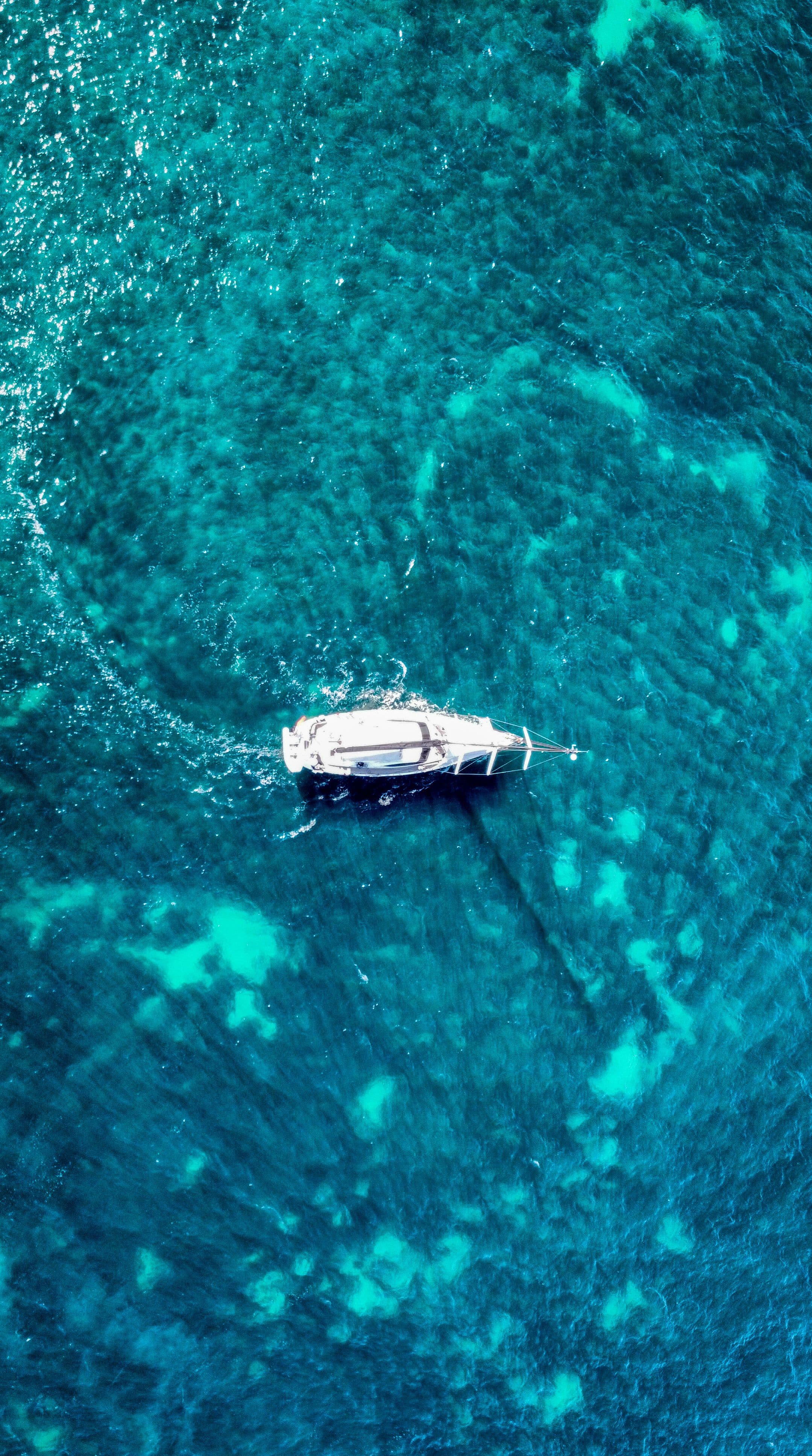 A yacht on turquoise water — coastal experience inspiration